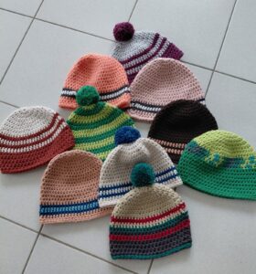 Spende von 10 Mützen für den guten Zweck